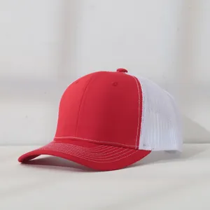 Side detail view of a premium red and white mesh trucker cap with white stitching.