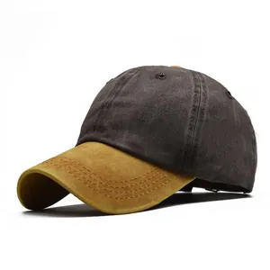 Vista detallada de la gorra de béisbol de algodón lavado en marrón y amarillo mostaza