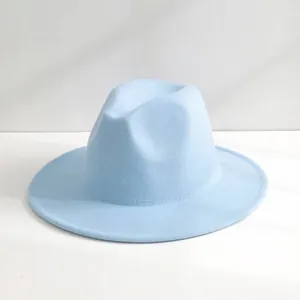 Detailed close-up of a light blue wool felt fedora hat with an elegant wide brim