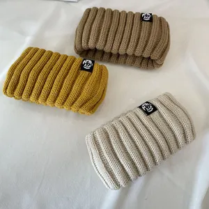 Detail view of the multi-color ribbed knitted winter headbands with soft texture