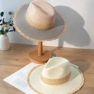 Vintage color-block straw sun hat with frayed edges and wide flat brim for summer sun protection
