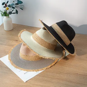 Retro color-block straw hats with frayed edges for sun protection, wide brim jazz style.