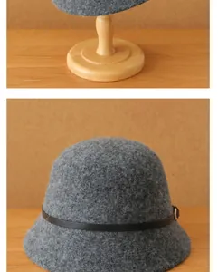 Vue détaillée d'un chapeau cloche en laine grise avec texture chaude et lanière