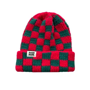 Red and dark green checkered thick knit beanie hat for winter warmth with woven label