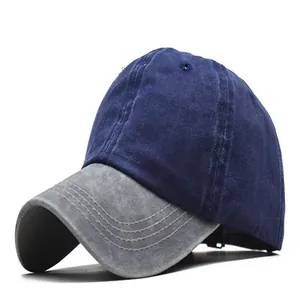 Vista lateral de una gorra de béisbol de algodón lavado en dos tonos azul y gris