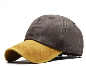 Vista detallada de una gorra de béisbol bicolor en algodón lavado gris y amarillo