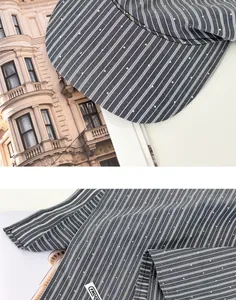 Gedetailleerde close-up van een grijs gestreepte retro hoofddoekpet met FRCC-label