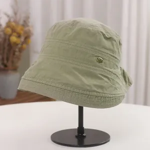 Vintage Japanese style foldable pleated bucket hat for women in light olive green