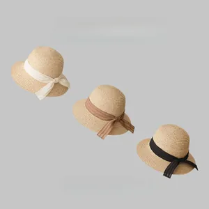 French retro straw sun hats with elegant ribbon bows for beach and summer travel