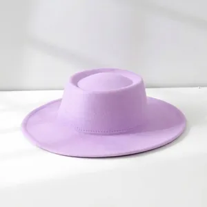 Macro view of the texture and flat brim of a lavender wool felt jazz fedora hat
