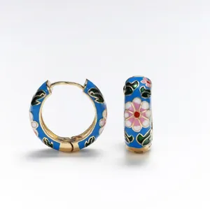 Exquisite retro gold-toned hoop earrings with blue enamel and colorful flower patterns