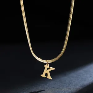 Close-up of 18K gold-plated stainless steel snake chain with a bold letter K pendant