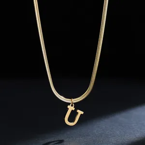 Close-up view of 18K gold plated stainless steel snake chain with letter U pendant