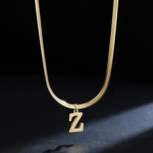 Close-up detail of 18K gold plated stainless steel snake chain with letter Z pendant.