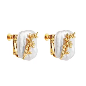 Elegant 18K gold-plated Baroque pearl clip-on earrings with delicate flower branch design.