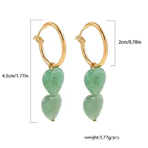 Detailed view of green heart-shaped drop earrings with 4.5cm length dimensions