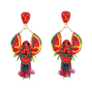 Handmade creative red beaded lobster drop earrings for women with vibrant ocean animal design