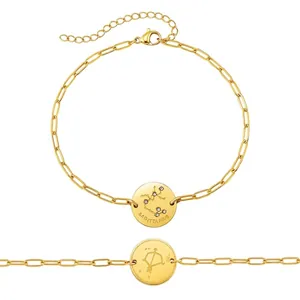Detailed view of 18K gold plated Sagittarius constellation pendant with bow symbol engraving.