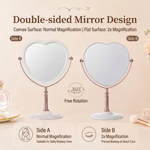 Rose gold heart-shaped double-sided makeup mirror with 2x magnification and 360 rotation