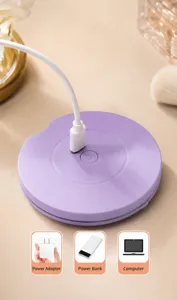 Detail view of a purple portable LED makeup mirror showing the USB charging port.
