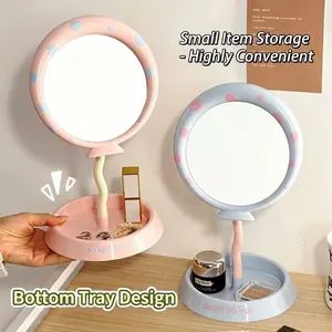 Cute pink and blue balloon-shaped desktop makeup mirror with jewelry storage tray base