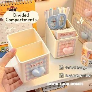 Cute divided desktop pen holder with heart-shaped knobs and plaid decor for stationery.