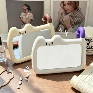 Schattige katvormige desktop make-upspiegel met een 360 graden draaibare handgreep wit