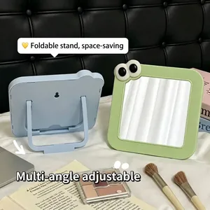 Espejo de maquillaje portátil con soporte plegable ajustable y diseño lindo