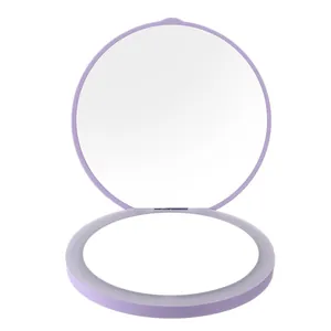 Tragbarer violetter LED-Klappschminkspiegel mit doppelseitigem rundem HD-Glas