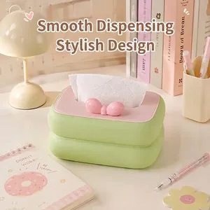 Grüner und rosa Taschentuchspender im Cream-Stil mit Schleife als Deko