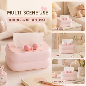 Cremefarbene Desktop-Taschentuchbox mit rosa Schleife für stilvolle Heimdekoration