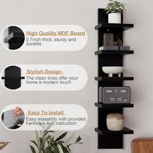 Detail view of black MDF floating wall shelf showing installation and material thickness