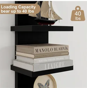 Close-up detail of black floating wall shelves highlighting a 40 lbs weight capacity
