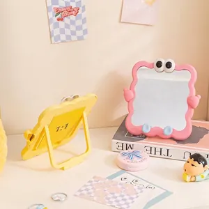 Cute cartoon desktop makeup mirror with adjustable hidden stand in pink and yellow