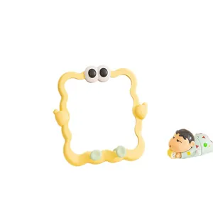 Cute yellow wavy frame desk mirror with cartoon eyes design for student dorm