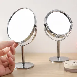 Miroir de maquillage de table argenté pivotant double face avec miroirs ovale et rond