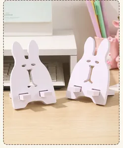 Supporto per cellulare bianco minimalista a forma di coniglio per scrivania e tablet
