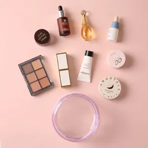Durchsichtige wasserfeste Kosmetiktasche für Reisen mit violettem Reißverschluss und Make-up
