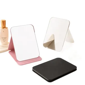 Tragbarer faltbarer Desktop-Schminkspiegel aus PU-Leder in Pink, Weiß und Schwarz