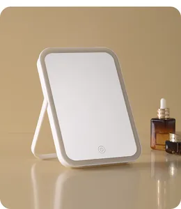 Detail view of portable LED makeup mirror with adjustable stand and touch switch