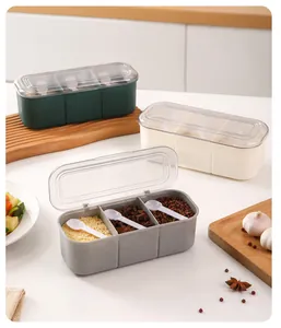 Detailed view of a 3-compartment seasoning box with spoons and a transparent lid.