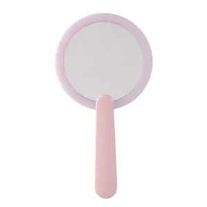 Specchio per trucco a mano a LED portatile con cornice rosa tonda e luce per studenti
