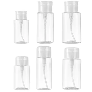Set of transparent travel dispenser bottles with pump for makeup remover and lotion