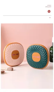 Detail of portable folding makeup mirror with textured lid and love day engraving