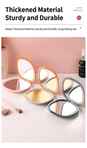 Portable folding compact makeup mirrors in multiple colors displayed with brushes.