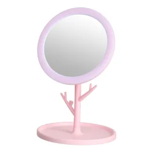 Pink LED tabletop makeup mirror with tree branch stand and storage tray for vanity