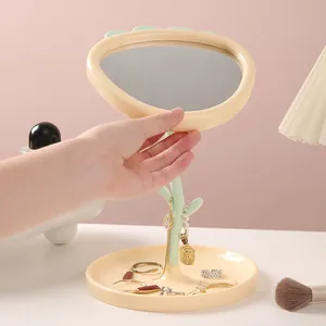 Adorable flower-shaped desktop makeup mirror with integrated jewelry storage tray