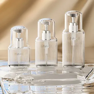Portable clear travel refillable pump bottles for lotion and shampoo set of three.