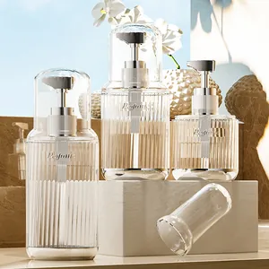 Refillable travel dispenser bottles set with clear ribbed texture and silver pumps