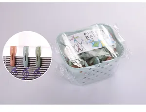 30-piece multi-colored plastic clothespins set with storage basket and clip detail